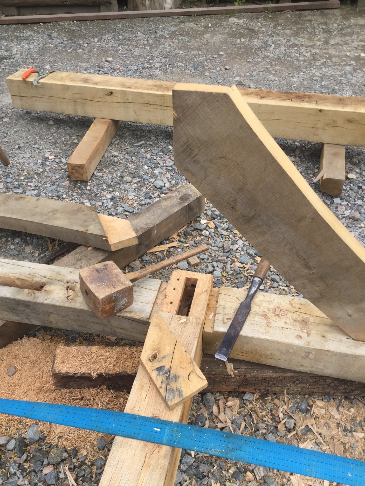 Traditional timber joint and hand tool at the Silverback wood yard